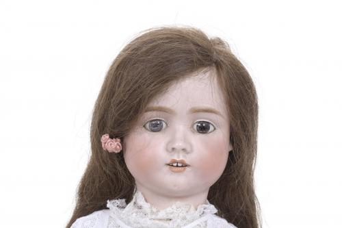 GERMAN PORCELAIN DOLL, 1906.