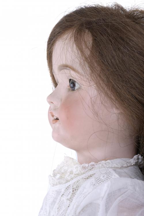 GERMAN PORCELAIN DOLL, 1906.