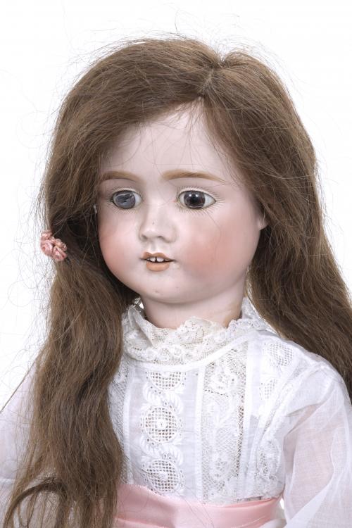GERMAN PORCELAIN DOLL, 1906.