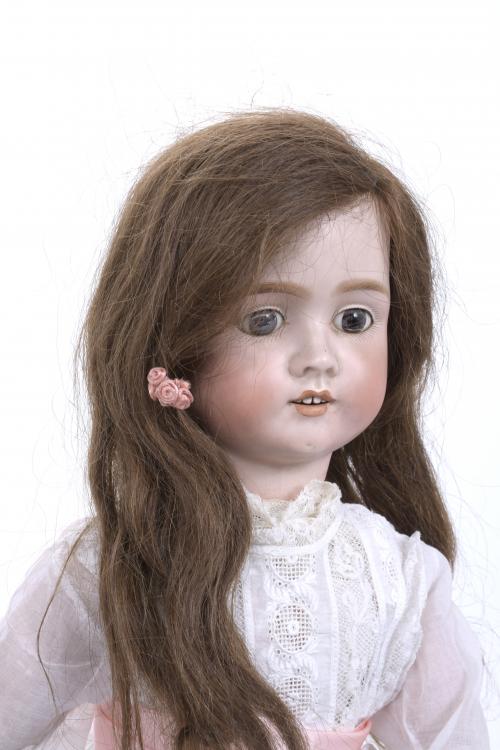 GERMAN PORCELAIN DOLL, 1906.