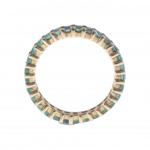 EMERALDS WEDDING RING.