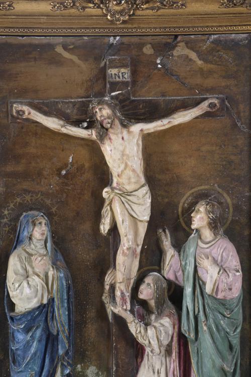 EMBOSSED PANEL DEPICTING CHRIST ON THE CROSS.