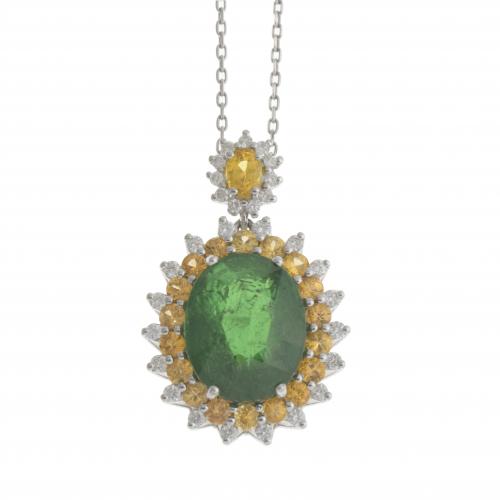 PENDANT WITH A LARGE EMERALD BORDERED WITH YELLOW SAPPHIRES AND DIAMONDS.