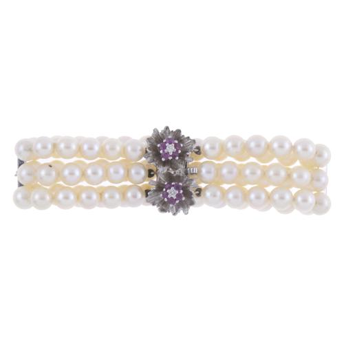 PEARLS WIDE BRACELET WITH GEMSTONES CLASP.