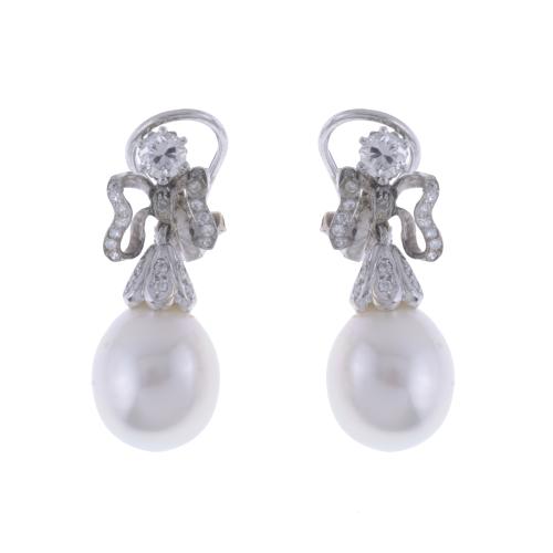 BOW EARRINGS WITH PEARL.