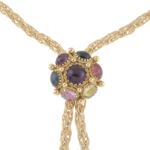 LONG NECKLACE WITH CORD AND GEMSTONES CABOCHONS.