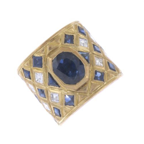 WIDE RING WITH SAPPHIRES AND DIAMONDS.