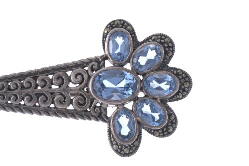 BROOCH WITH MARCASITES AND BLUE SPINEL.