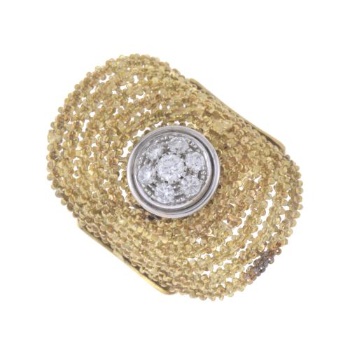 ORLANDINI. LARGE OVAL FILIGREE RING WITH DIAMONDS CENTRE.