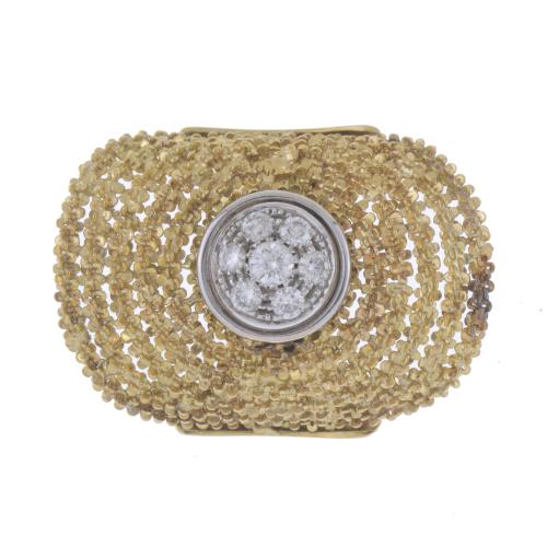 ORLANDINI. LARGE OVAL FILIGREE RING WITH DIAMONDS CENTRE.
