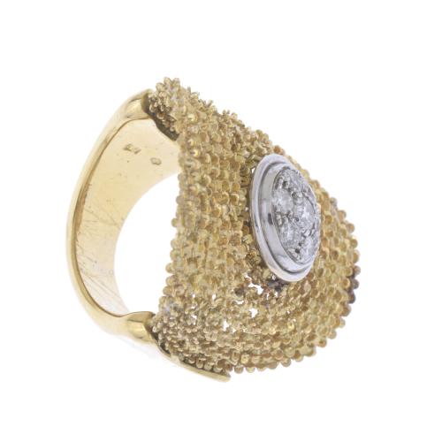 ORLANDINI. LARGE OVAL FILIGREE RING WITH DIAMONDS CENTRE.