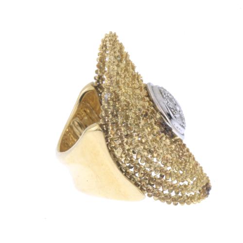 ORLANDINI. LARGE OVAL FILIGREE RING WITH DIAMONDS CENTRE.