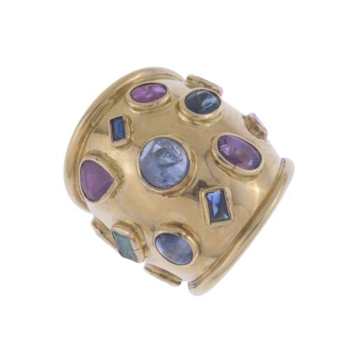 LARGE BULGARI-LIKE RING WITH ASSORTED GEMSTONES.