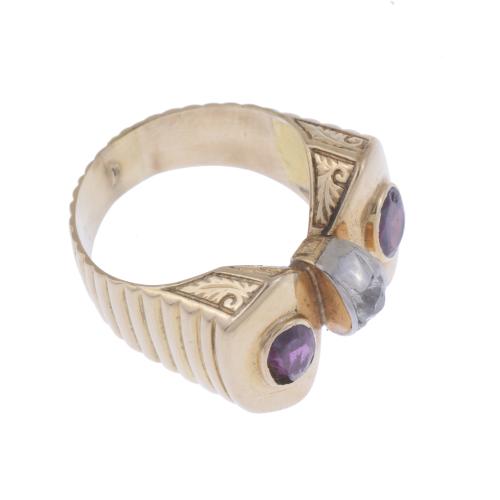 CHEVALIER RING WITH GARNETS.