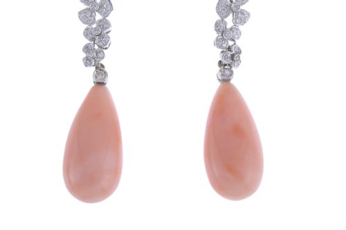 LONG FLORAL EARRINGS WITH DIAMONDS AND CORAL TEARDROP.