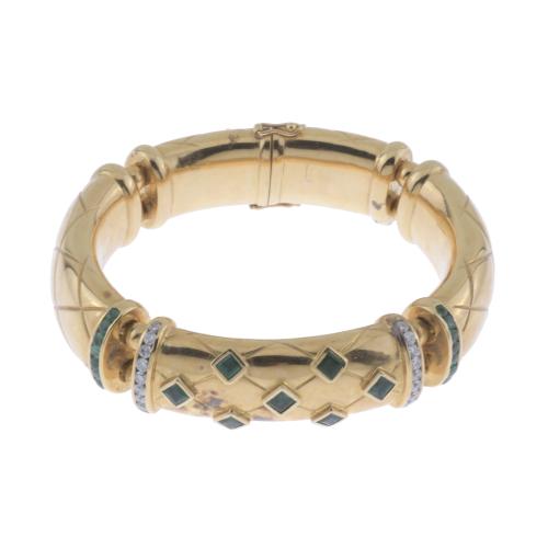 PULSERA ESCLAVA CON DIAMANTES Y ESMERALDAS.
