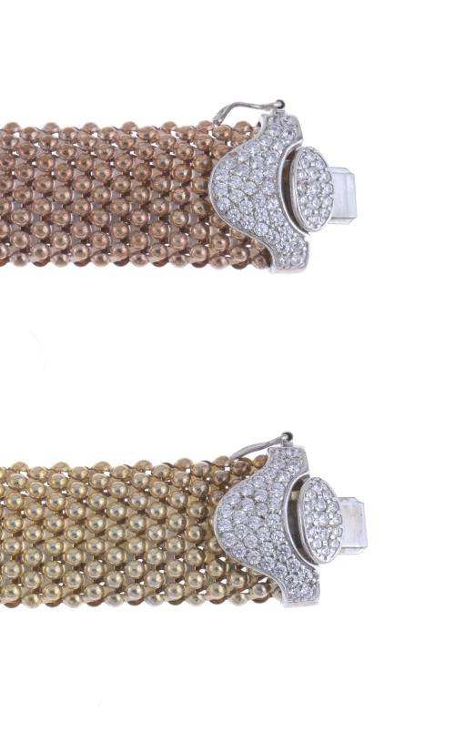TWO MESH AND ZIRCONS BRACELETS.