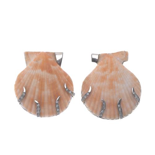NATURAL SHELL EARRINGS WITH DIAMONDS.