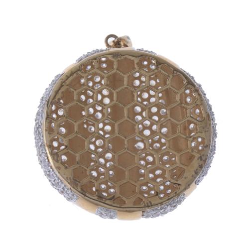 PENDANT IN GILDED SILVER AND ZIRCOS PAVÉ.