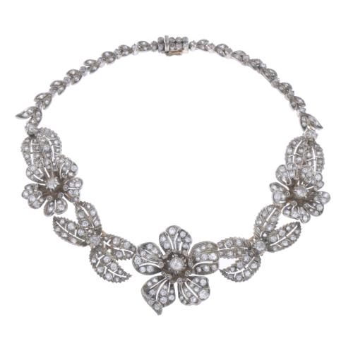 ATTR. TO MELLERIO, CIRCA 1905. TRANSFORMABLE FLORAL CHOKER.