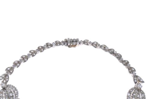 ATTR. TO MELLERIO, CIRCA 1905. TRANSFORMABLE FLORAL CHOKER.