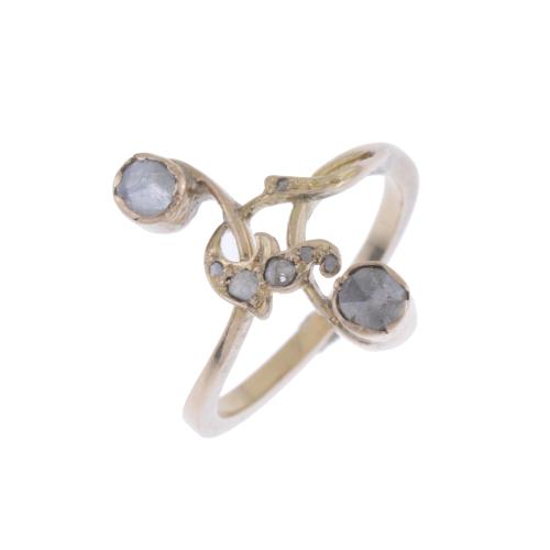 MODERNIST RING WITH DIAMONDS.