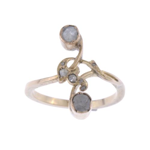 MODERNIST RING WITH DIAMONDS.
