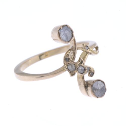 MODERNIST RING WITH DIAMONDS.
