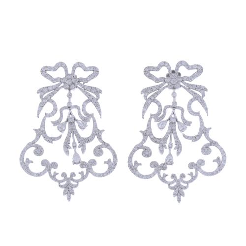 FANTASY EARRINGS WITH BOWS.