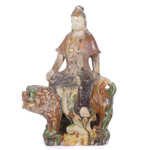 GUANYIN ON A FOO LION, QING DYNASTY, LATE 19TH CENTURY.