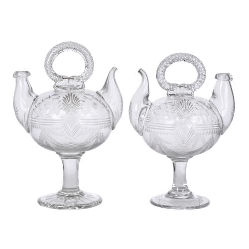 Pair of glass pitchers, 1935.