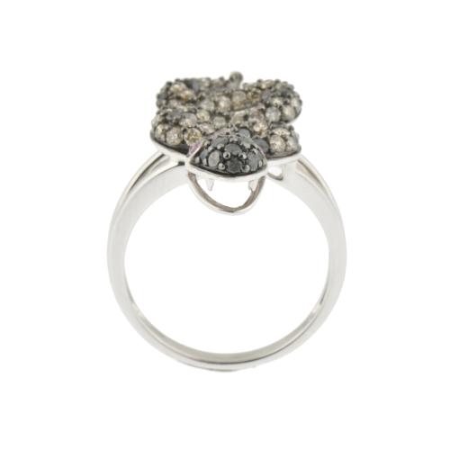 Snake-shaped ring with diamonds and rubies.