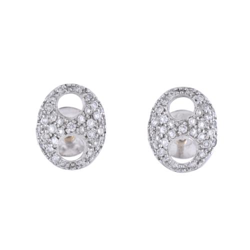 Rope-shaped earrings with diamonds.