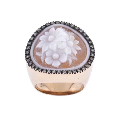 Carved shell ring with flowers.