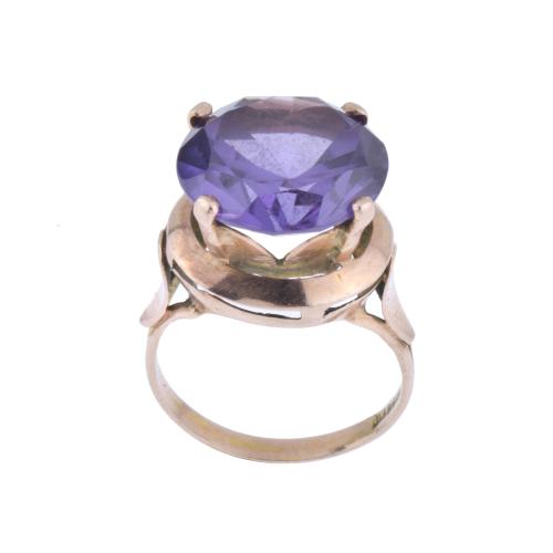 Ring with large amethyst.