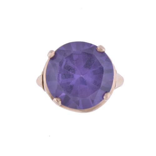 Ring with large amethyst.