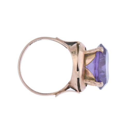 Ring with large amethyst.
