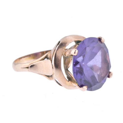 Ring with large amethyst.