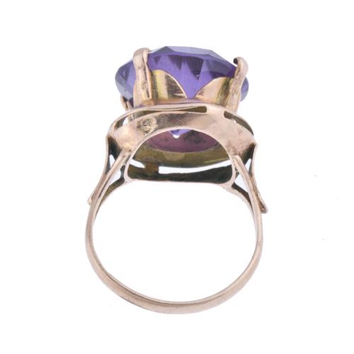 Ring with large amethyst.