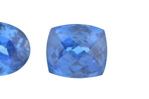 Set of three unmounted London blue topazes.