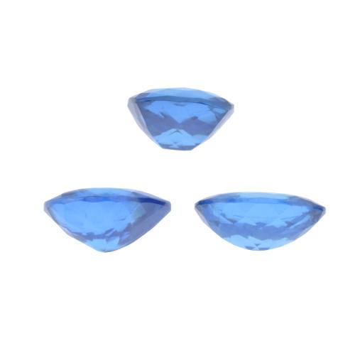 Set of three unmounted London blue topazes.