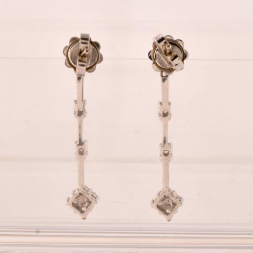 Diamonds long earrings.