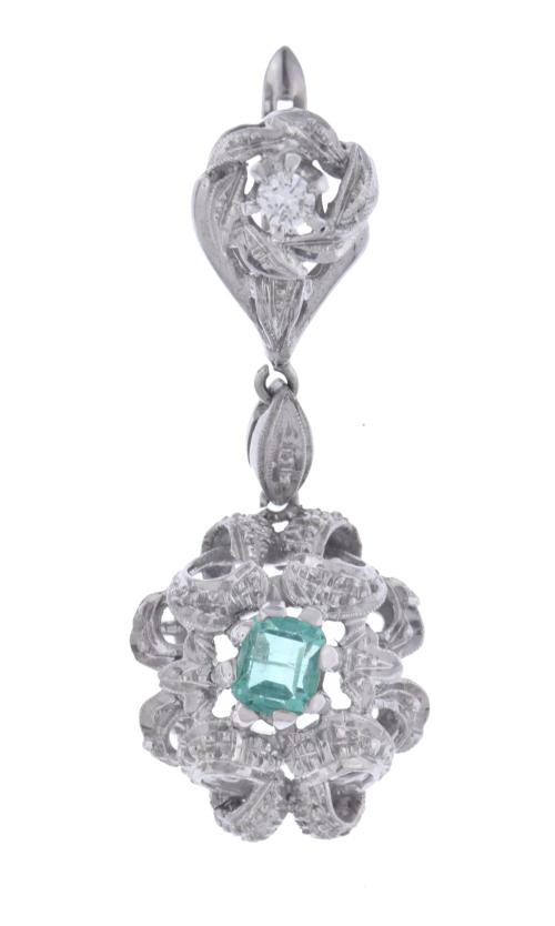 Emeralds and diamonds floral earrings.
