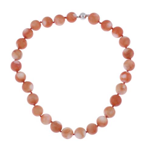 Necklace with orange coral beads.