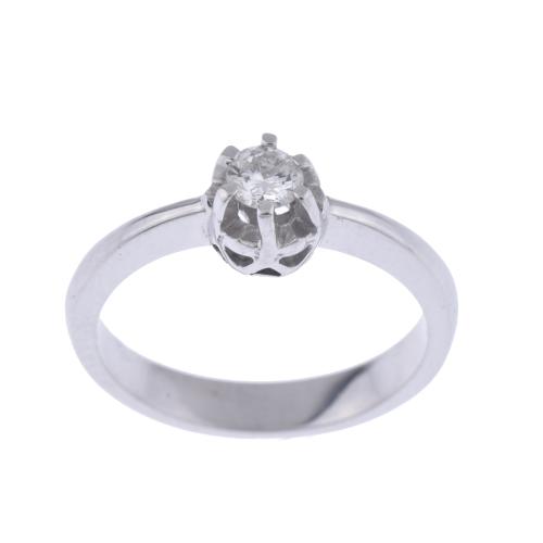 Diamond solitaire ring.