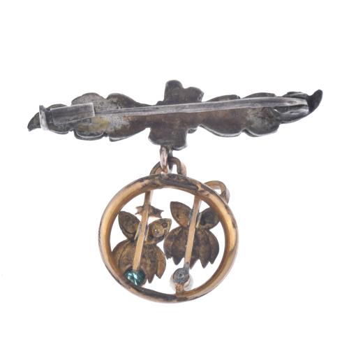 Modernist style diamonds brooch with pendant.