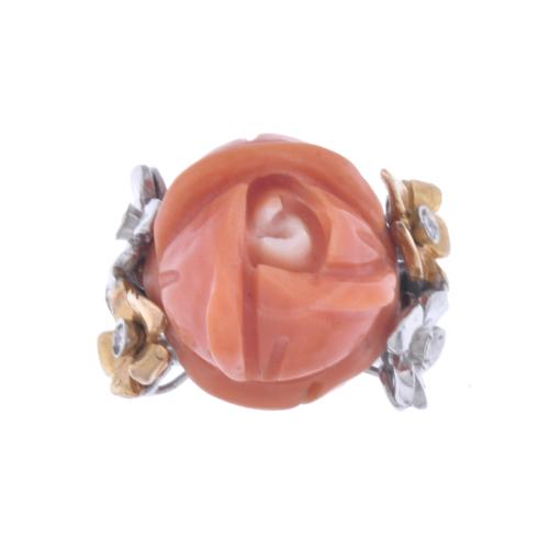 Ring with rose coral flower and diamonds.