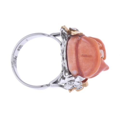 Ring with rose coral flower and diamonds.