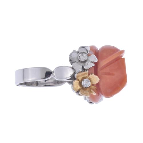 Ring with rose coral flower and diamonds.