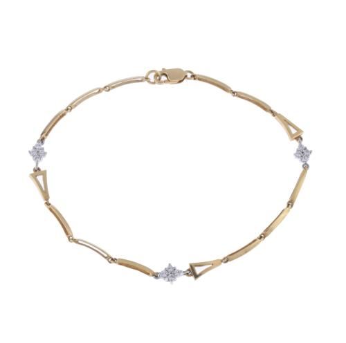 Pulsera en oro bicolor y diamantes.